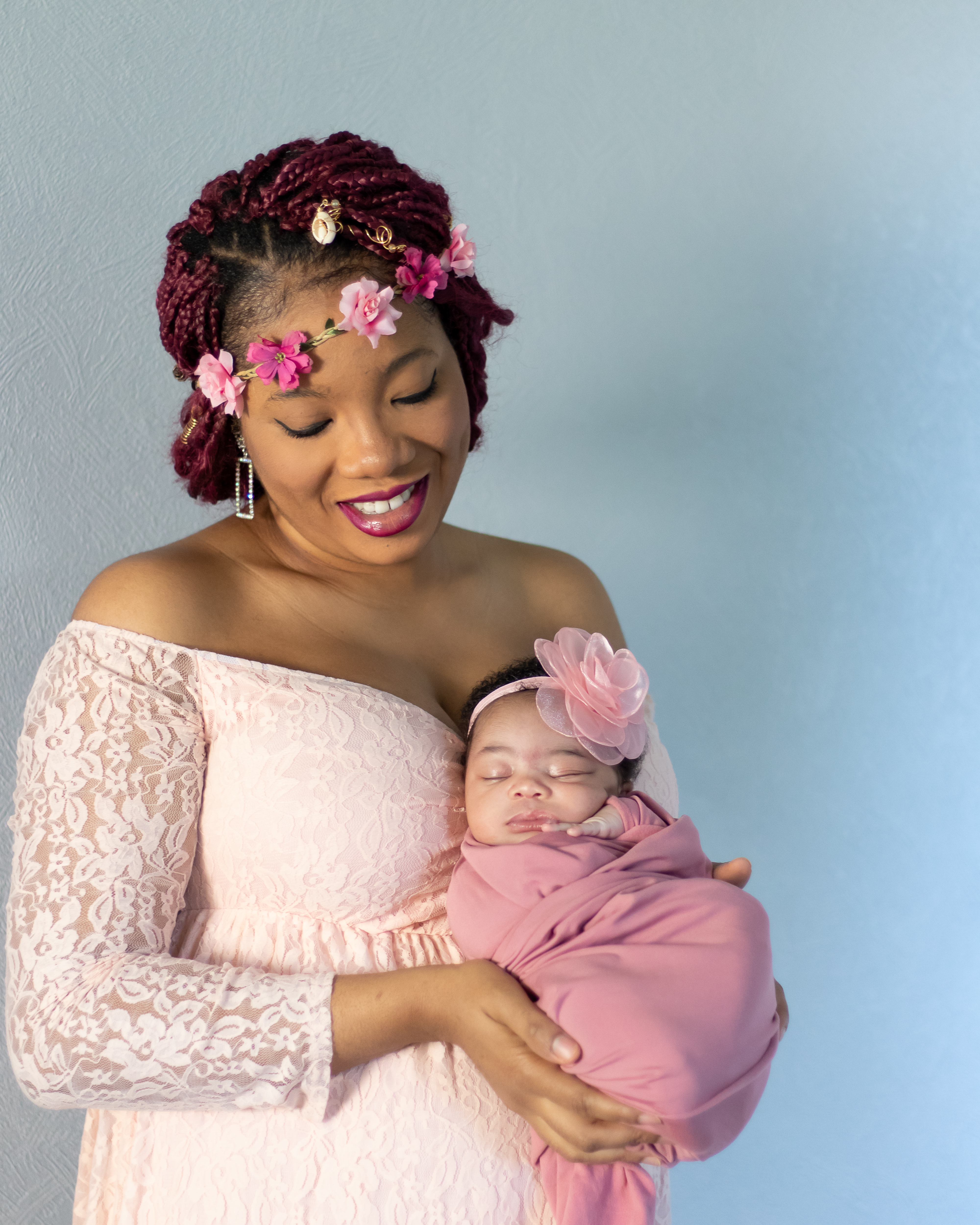 Mom holding sleeping baby, all in pink, lifestyle baby photographer