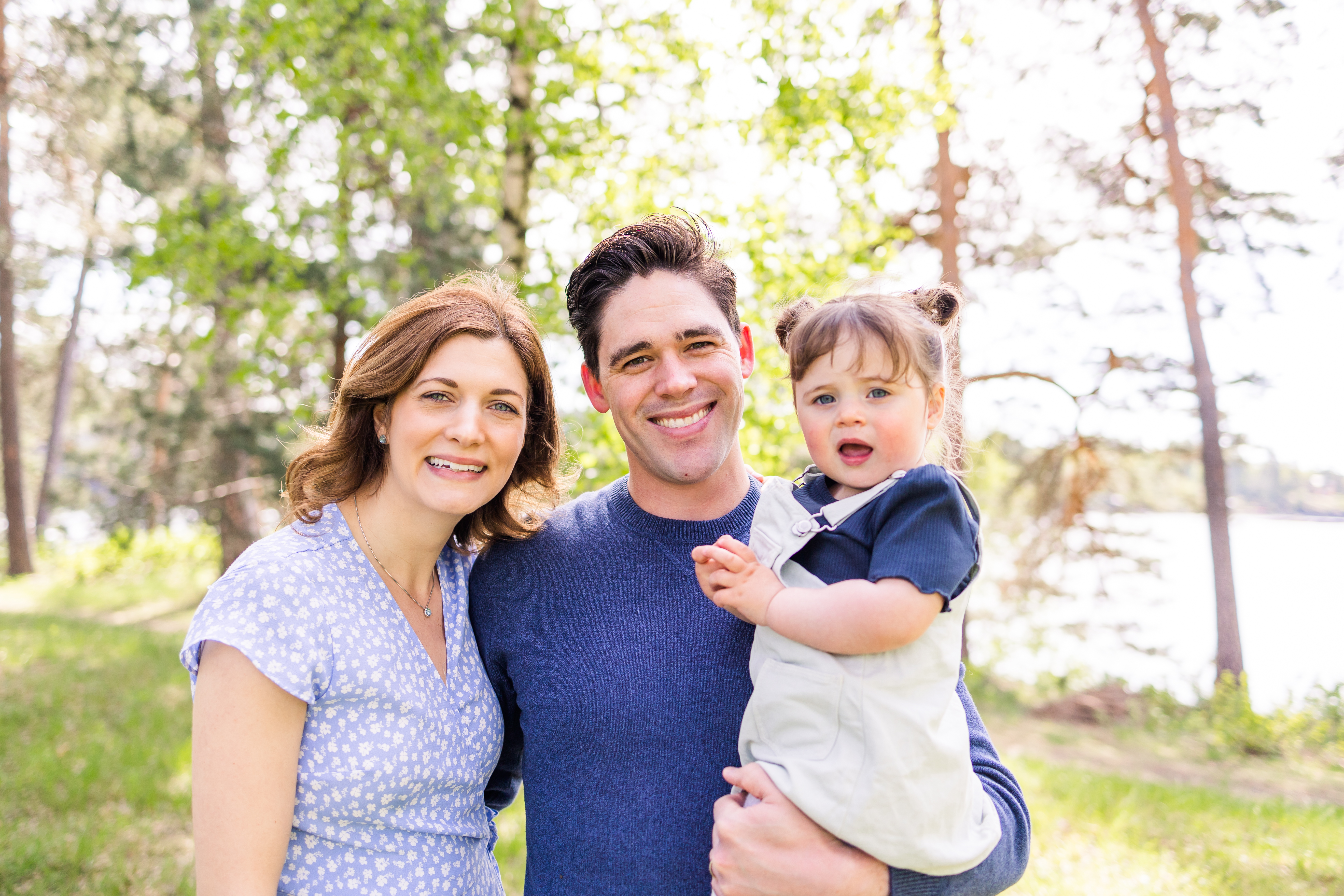 Family of three snuggled together