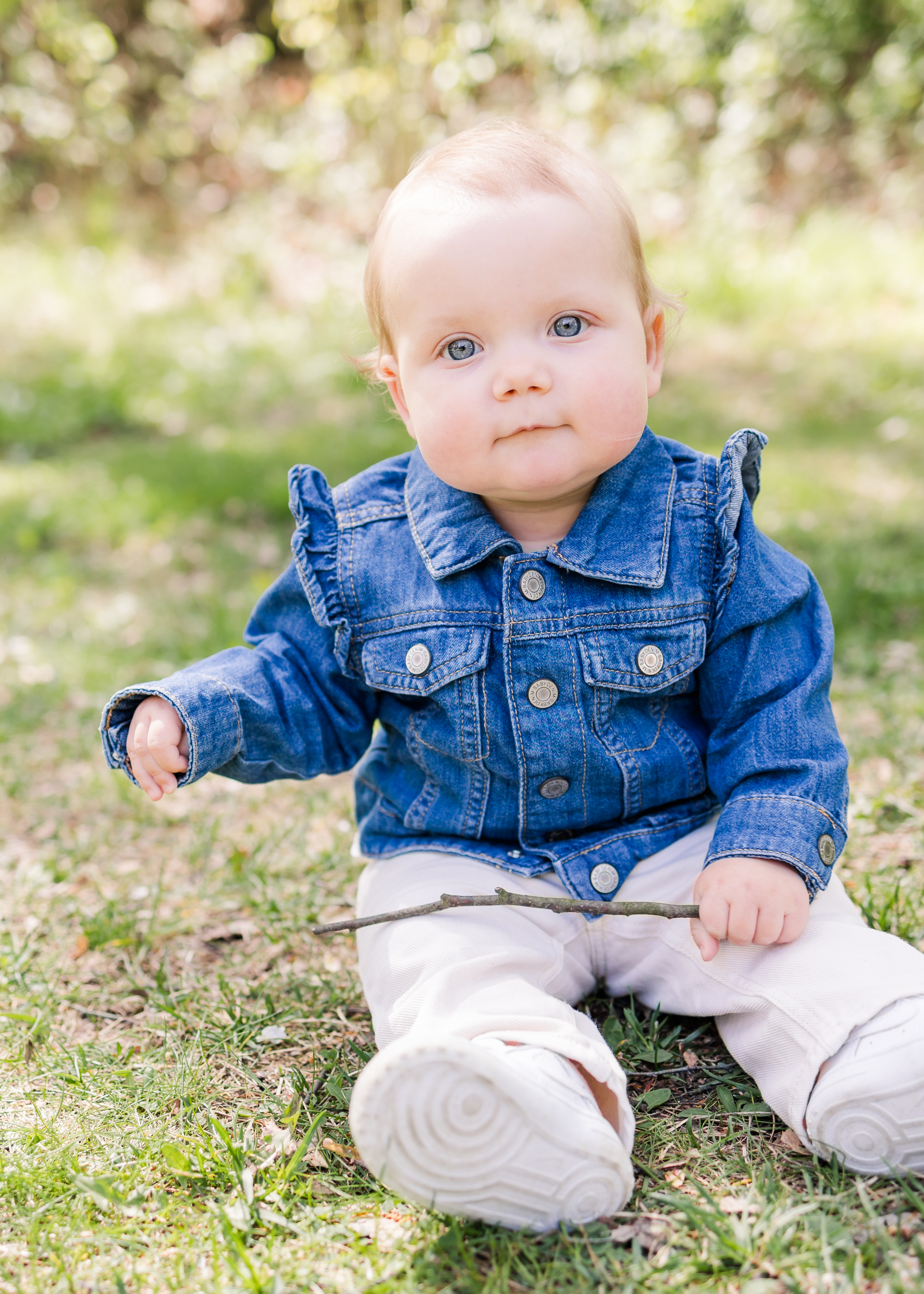 Adorable baby holding stick, baby photographer in Creede