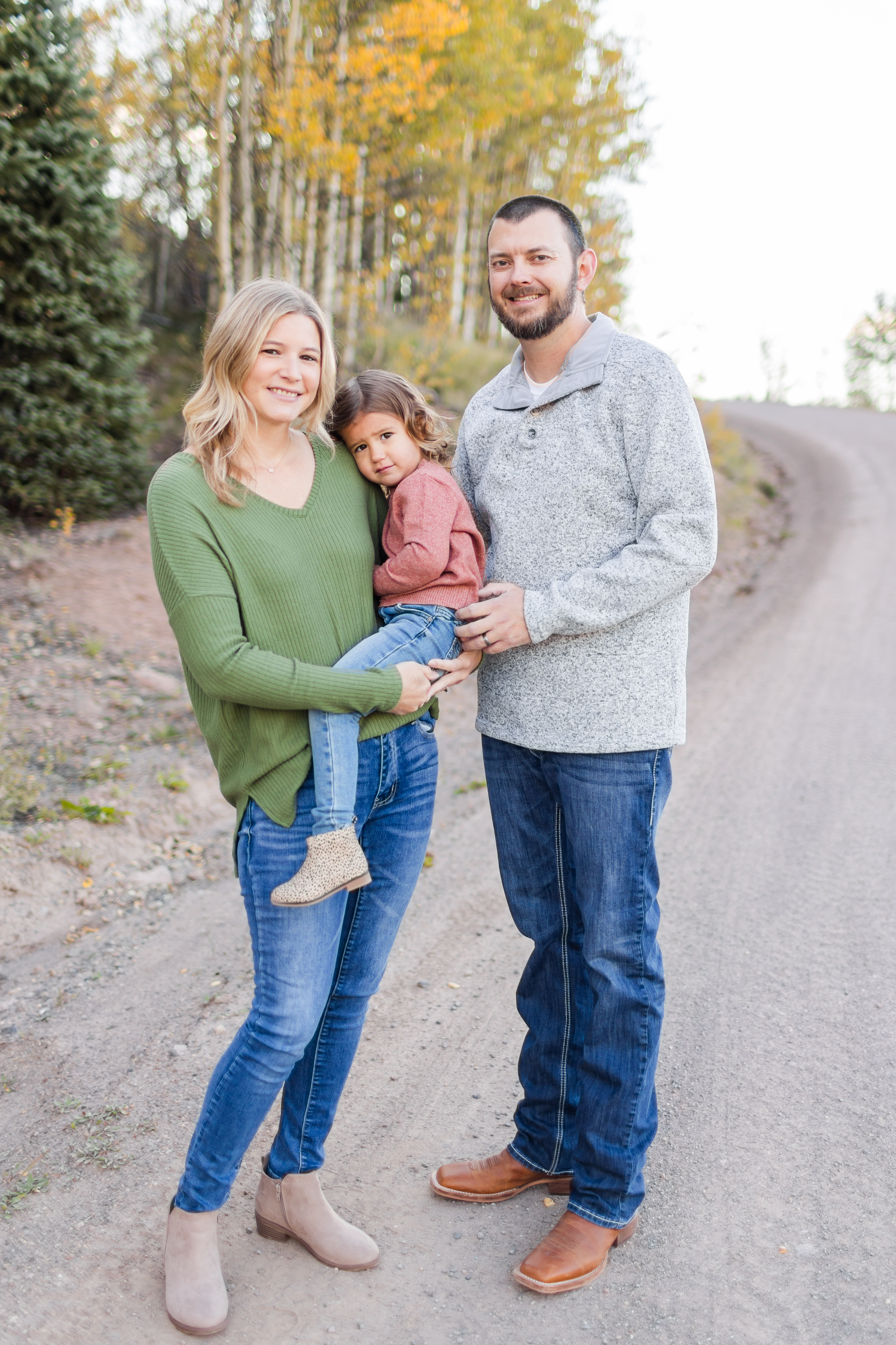fall family photographer, family of three snuggling