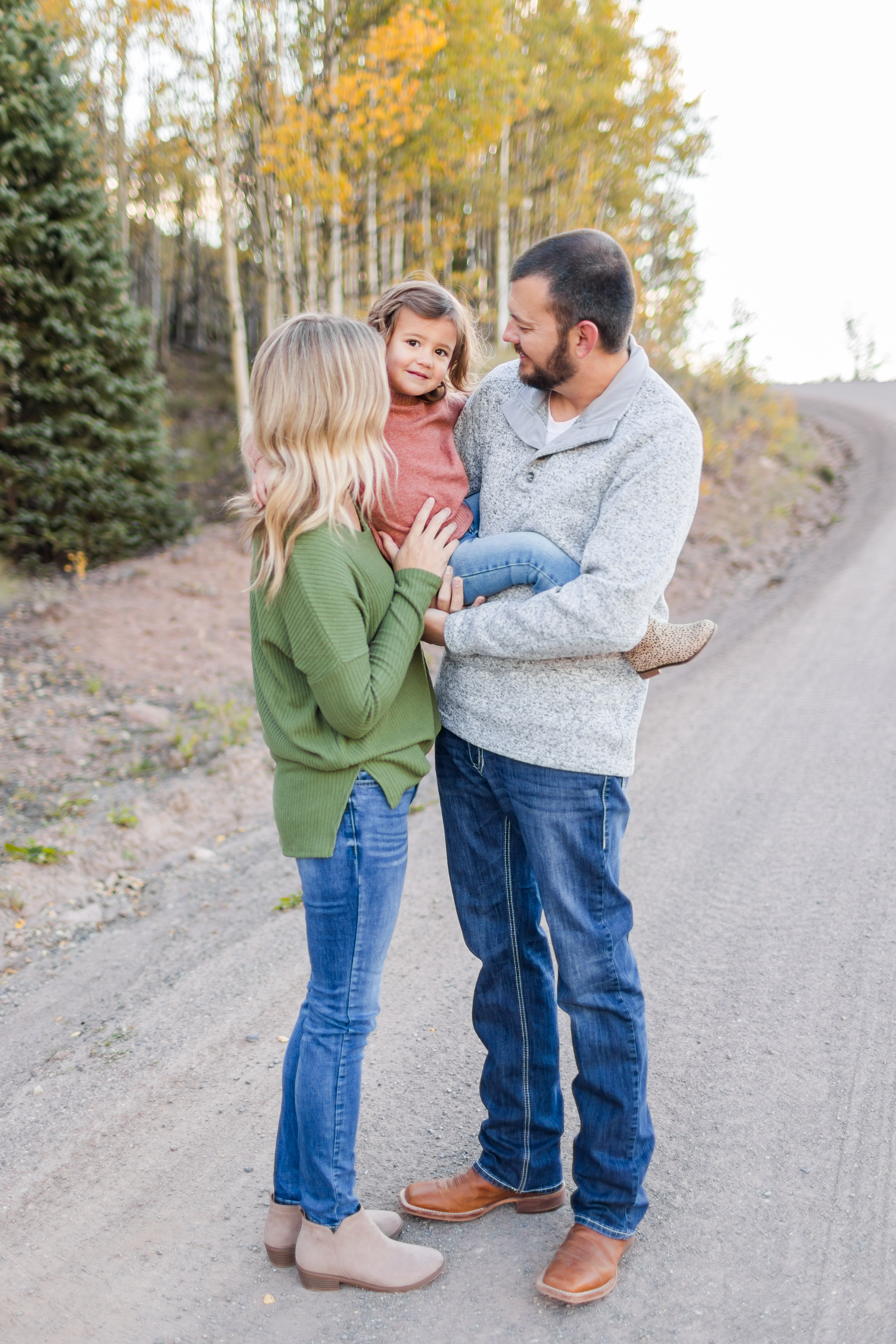 Family of three in the Colorado mountains